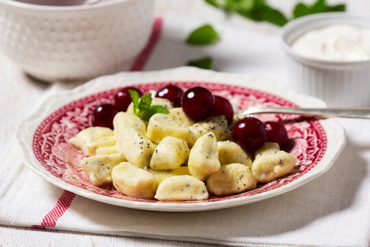 Lazy Vanilla Dumplings with Poppy Seeds, Sour Cream and Cherry Sauce