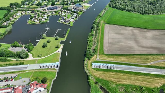 Road aqueduct crossing a waterway in the Dutch countryside