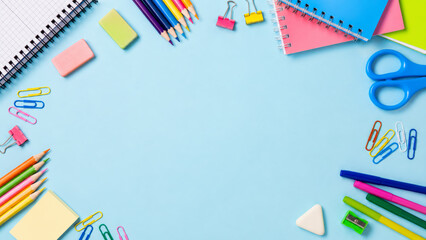 Obraz premium Colorful school supplies flat lay on blue background. Back to school stationery border with notebooks, pencils, scissors and paper clips. Copy space for sale or Teacher Day promotion