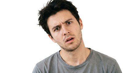 Fototapeta premium Confused young man with messy hair tilting his head and looking at the camera