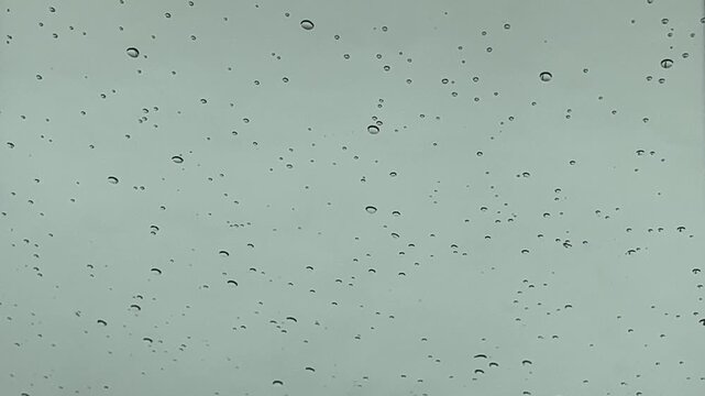 Soft Calm Rain Droplets on Glass Clean Neutral Wall Texture Background