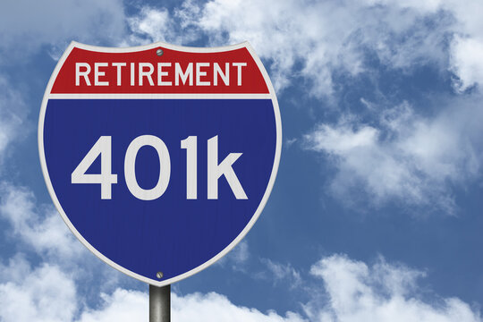 401k Retirement Text on an American interstate road sign with sky