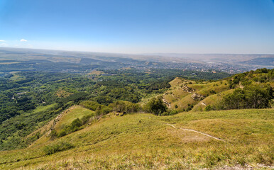 Obraz premium View of the mountains and Kislovodsk from the observation decks of the Kislovodsk Park