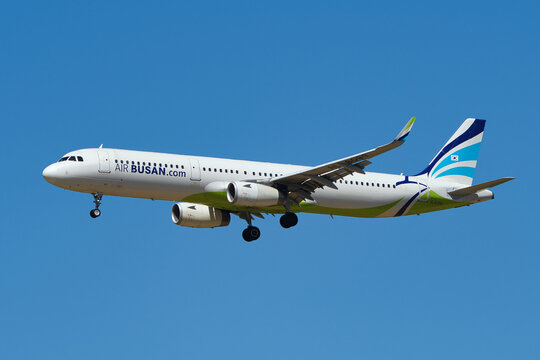 Air Busan Airbus A321-200 (HL8039) on final approach to Narita International Airport under clear blue sky