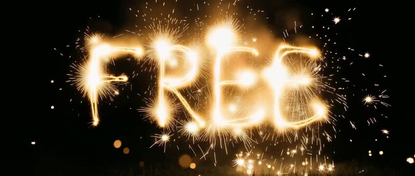 Sparkler forming the word free in the night sky. Glowing light writing for Independence Day celebration. Pyrotechnic effect for national holiday and party display.