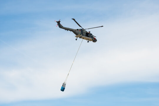 Water Sampling, Military Helicopter Carrying Heavy Cargo Net Sling Load Under Airframe, The Concept of Helicopter Logistics