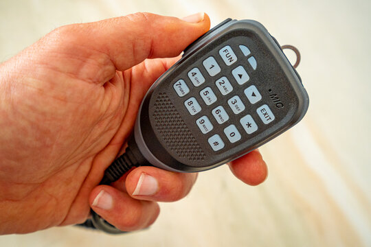 VHF and UHF amateur radio PTT with alphanumeric keypad.