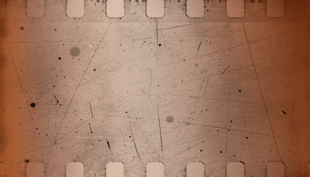 Vintage film strip texture with heavy dust, scratches and grain. Sepia tone old cinema overlay with light leaks for