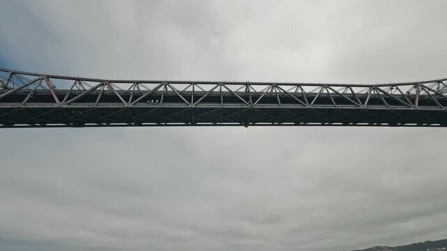 View from boat traveling under Richmond-San Rafael Bridge