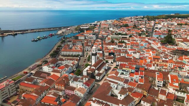 Aerial overview of historic center, church tower and port in Ponta Delgada