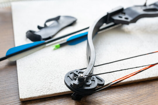 Close-up of compound bow and arrow