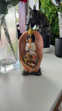 Angel figurine on white table