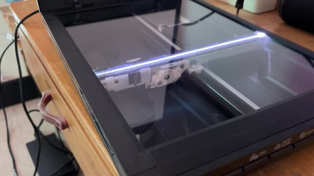 The process of scanning the indicator lights on the scanner machine.