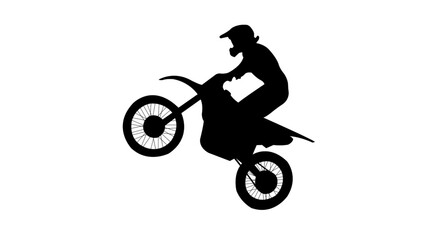 Silhouette of a motocross rider performing a wheelie stunt on a dirt bike © Ating