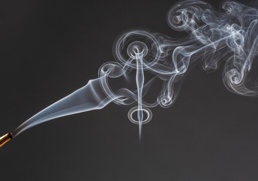Abstract white smoke rising from a burning incense stick. Swirling vapor patterns creating delicate shapes against a dark background. Concept of relaxation, meditation and aromatherapy.