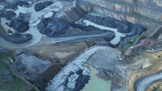 Marino, Adelaide, South Australia &ndash; 4K aerial drone footage of Linwood Quarry, limestone extraction, hard rock aggregates, terraced quarry walls, mining operation between Seacliff Park, Hallett Cove