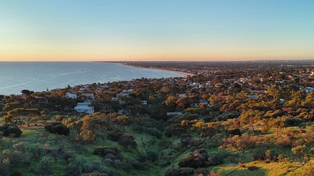 Seacliff, Adelaide, South Australia &ndash; 4K aerial drone footage of sandy beach, Gulf St Vincent coastline, sunset seascape, coastal suburb, homes, scenic shoreline, Kingston Park, Brighton, Marino