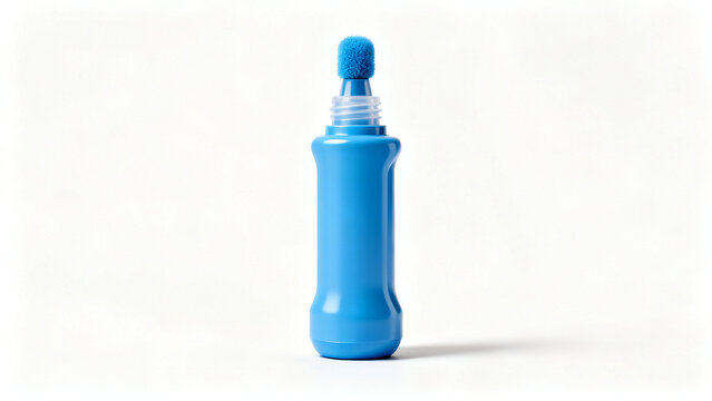 A bright blue bingo dauber marker with a sponge tip and cylindrical body standing upright on white surface.