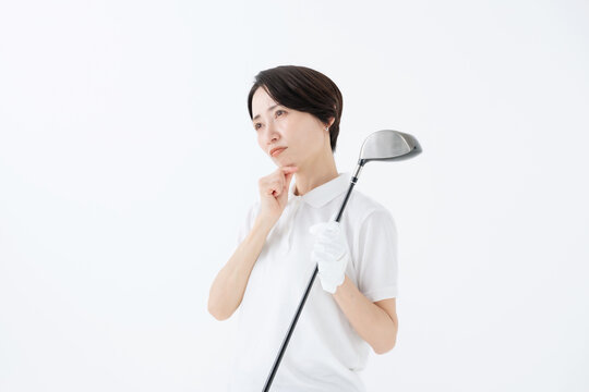 悩む女性　ゴルフ　白バック