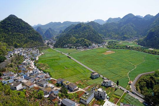 Guizhou, China 18MARCH2026 :A small rural village amidst the stunning scenery of Wanfenglin (Forest of Ten Thousand Peaks) national park in Xingyi, Guizhou, China