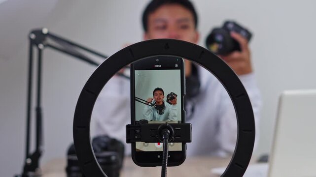 Content creator filming with professional gear in studio setting
