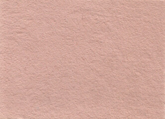 Fototapeta premium High-resolution blush pink handmade pressed paper texture canvas. The clean neutral pastel background features rustic mottled specks and a soft rough matte surface layer suitable for modern corporate