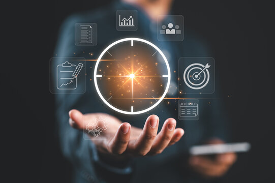 Businessman holding virtual clock interface with productivity and time management icons, deadline planning, scheduling efficiency and performance optimization concept