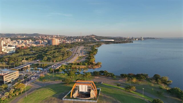 Anfiteatro P&ocirc;r do Sol ascending drone shot over Porto Alegre waterfront with Gua&iacute;ba River and Beira Rio stadium