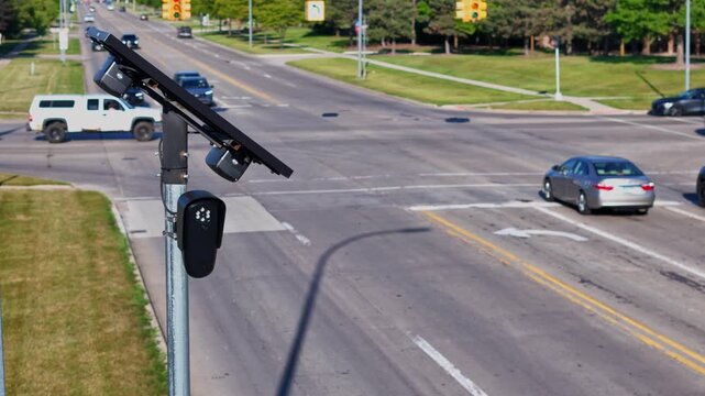 Flock traffic surveillance camera monitoring road intersection in Brownstown, Michigan