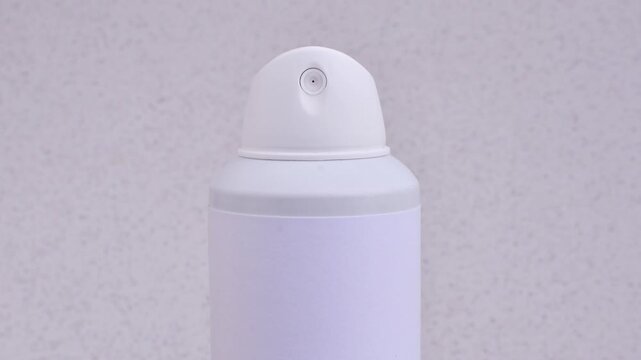 Clear image of spray deodorant, capturing its modern packaging and the refreshing sensation it offers.