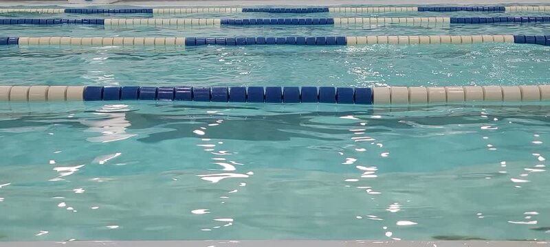 Indoor Swimming Pool Lanes with Clear Blue Water and Floating Lane Ropes