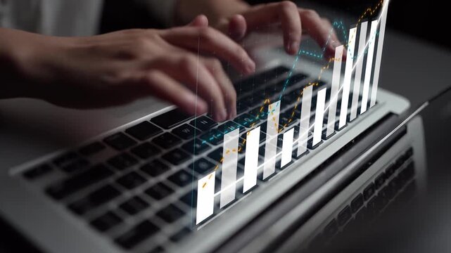 Close-up shot of hands typing on a sleek laptop keyboard, showcasing a modern workspace filled with digital elements that convey technology and data interaction. Copula