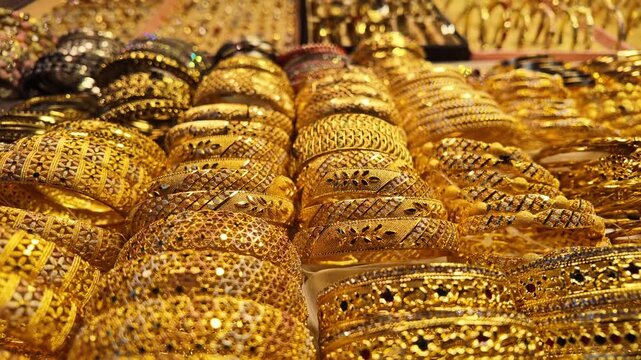 Exploring gold bangles in a busy market