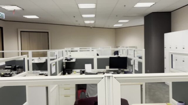 Empty office workstation featuring desk equipment and workspace setup, representing business, corporate, and workplace concepts.