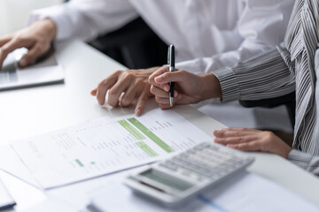 Fototapeta premium Auditor or internal revenue service staff, Business women checking annual financial statements of company. Audit Concept.