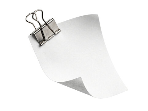 Floating white paper sheet with silver binder clip