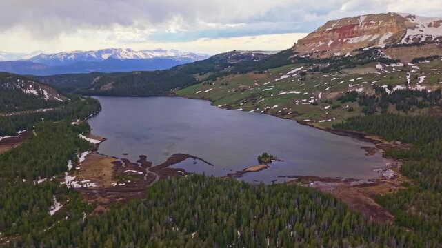 Scenic aerial view of Beartooth Lake with a rugged mountain range in the foreground in Wyoming