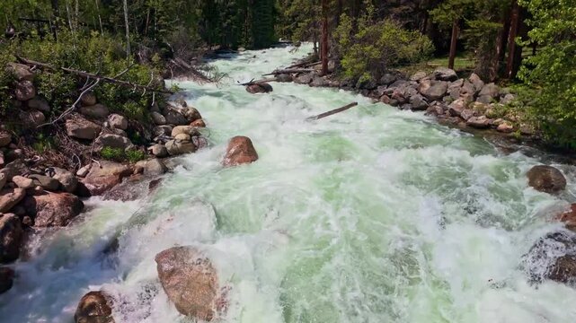 Scenic view of Lake Creek flowing through the mountains beside Beartooth Highway in Wyoming