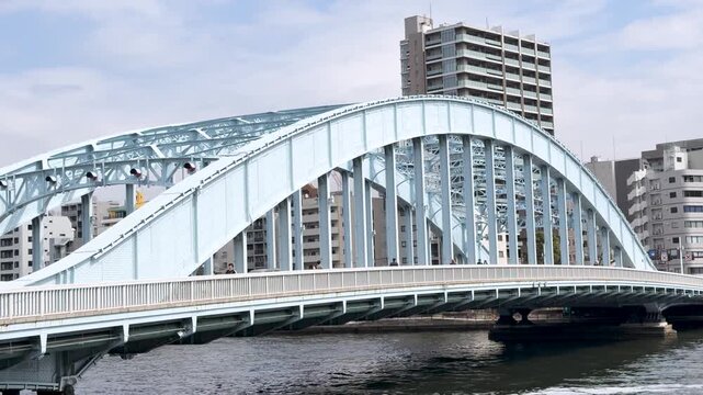 Light Blue Steel Arch Eitai Bridge Over Sumida River in Tokyo