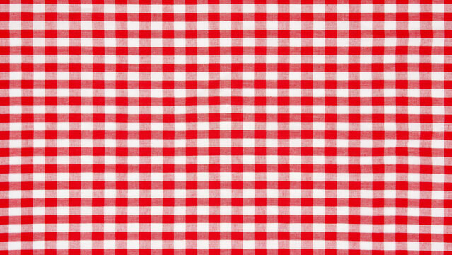 Red gingham fabric pattern background.