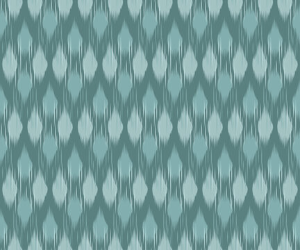 Seamless blue ikat diamond pattern for textile, wallpaper, fabric, wrapping paper, and home decor.