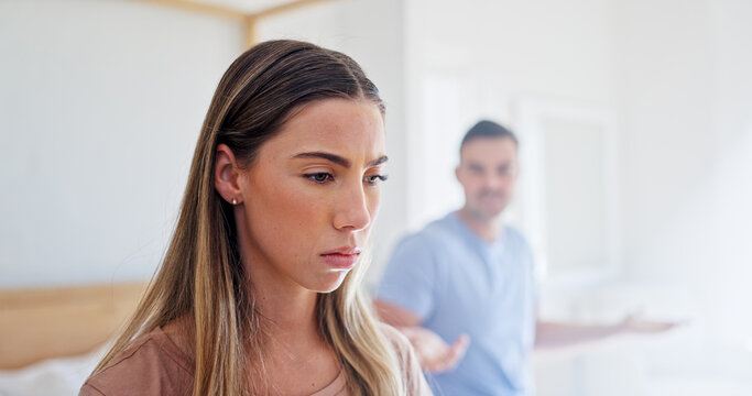 Annoyed, conflict and woman in bedroom of home for argument, disagreement or relationship stress. Anger, fight and frustration with couple on bed in apartment for decision, fail or marriage mistake