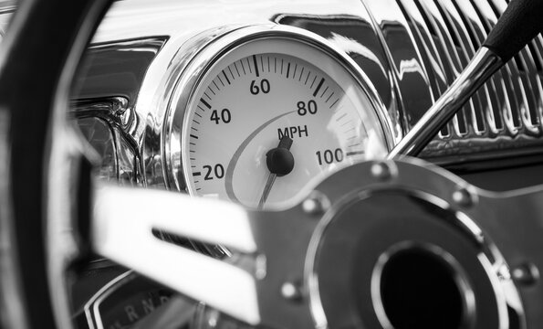 Speedometer in a classic car at a car show