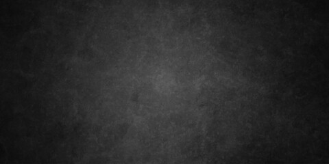 Dark charcoal grunge wall texture background. Dark black rough grunge surface with smoke edge. Black texture chalk board and black board. © MDFAIMIDULISLAM