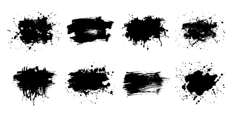 Fototapeta premium Set of eight black ink splatters and brush strokes, rendered with a raw, textured effect, perfect for adding a grunge or distressed aesthetic to graphic designs.