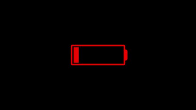 Glowing neon showing a low battery icon and a tired person appearing in the foreground, suggesting a concept of burnout and fatigue in medical professionals HD video animation.on a black backgraund.
