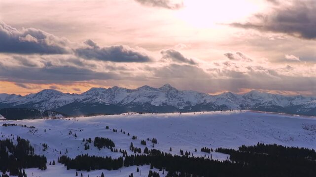 Winter Sunset Mount of the Holy Cross aerial drone Sawatch Range Colorado Rockies 14er Vail Pass backcountry bowl glades snow-covered peaks nature landmark landscape Cross of Snow circle left motion