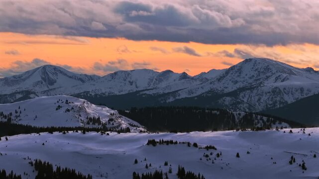 Mount of the Holy Cross winter sunset landscape aerial drone Sawatch Range Colorado Rockies 14er backcountry Vail Pass White River National Forest Sawatch Range snow-covered peak landmark cloud motion