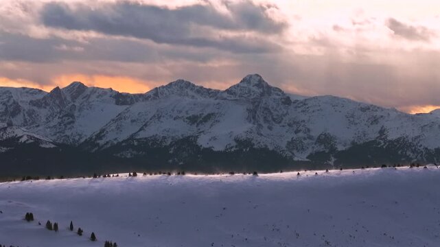 Winter Sunset Vail Pass Mount of the Holy Cross aerial drone Sawatch Range Colorado Rockies 14er backcountry Notch Mountain snow-covered peak nature landmark landscape Cross of Snow forward pan