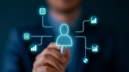 Fototapeta premium Businessman in a suit holds a stylus, interacting with digital icons representing data analysis, user profiles, and business metrics in a modern office environment